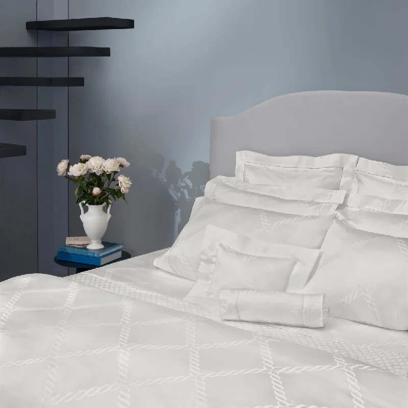 Solid - colored duvet covers in classic colors like white, black, and navy for a timeless lookOri Treccia Bed Linen by Pratesi